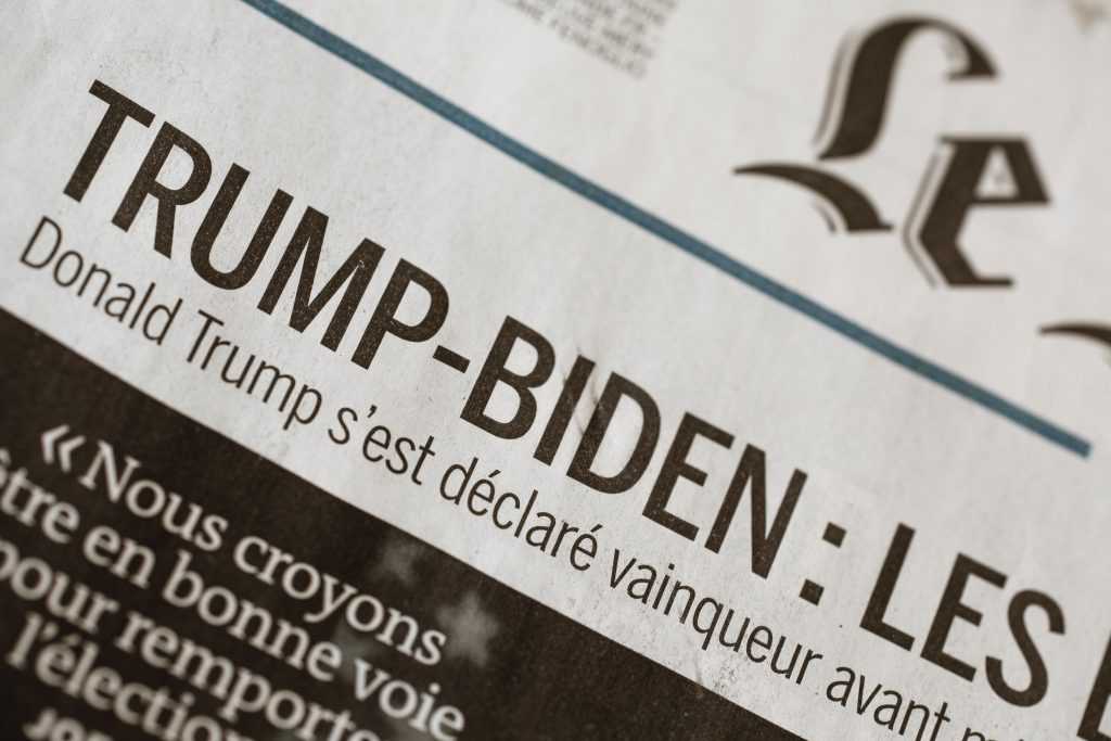 A newspaper publishes avout the Biden-Trump feud.
