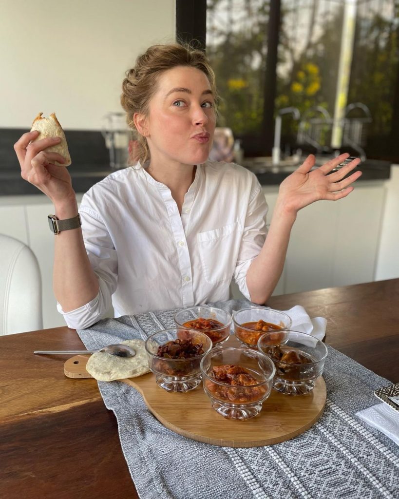 Amber Heard enjoying her food