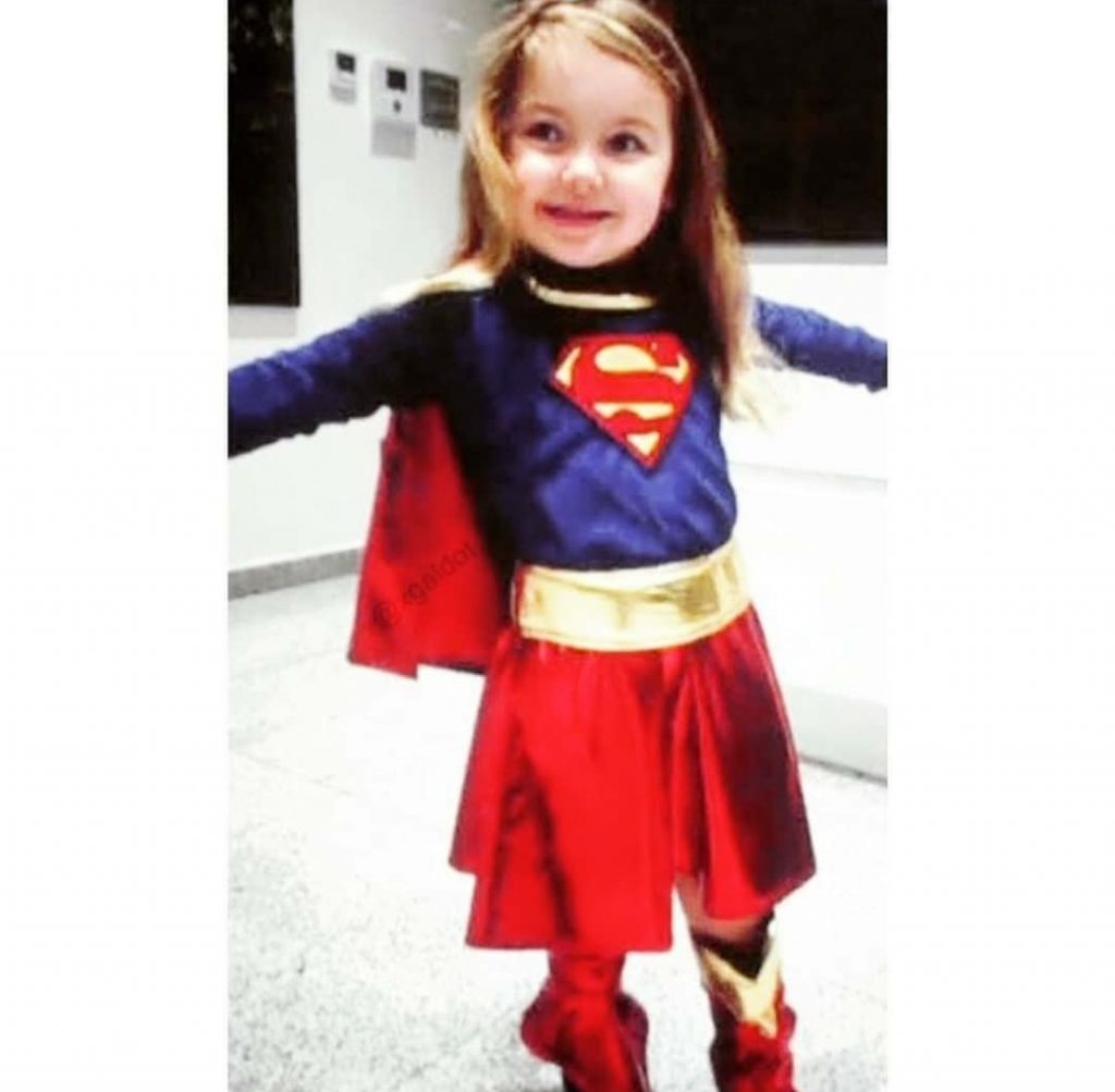 Alma Varsano wearing Superman Costume