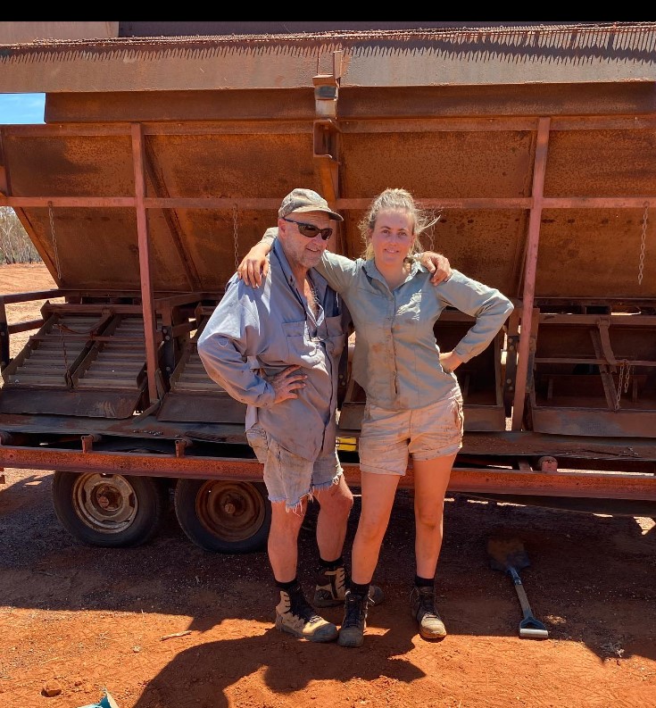 Tyler Mahoney with her associate posing in one of the gold fields.