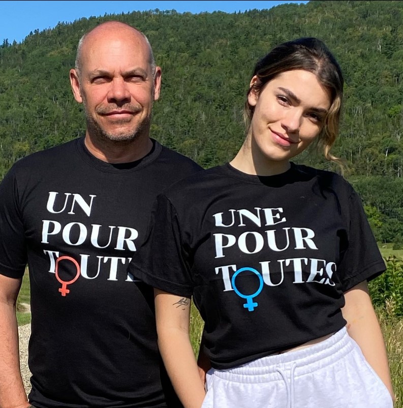 Livia and her father wearing twinning by wearing the black t shirt