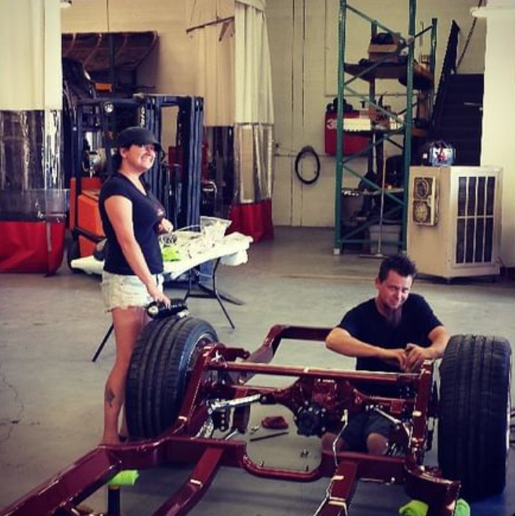 Charity helping in modifying a car at the Kindig-It Design