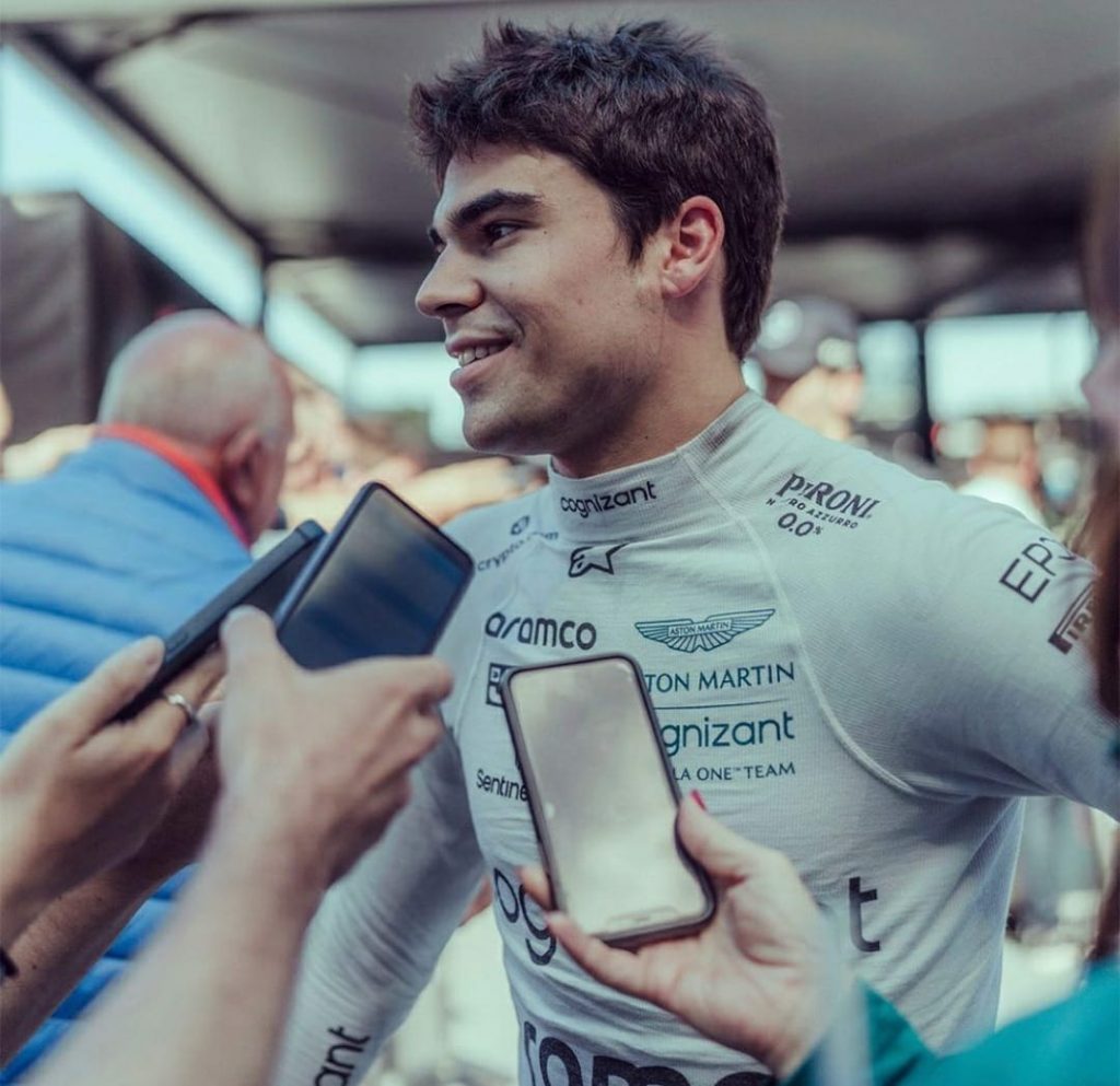 Lance Stroll wearing Aston Martin racing jersey after the match.