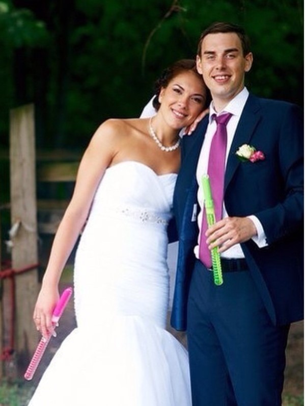 Yuliya with her husband on the wedding day