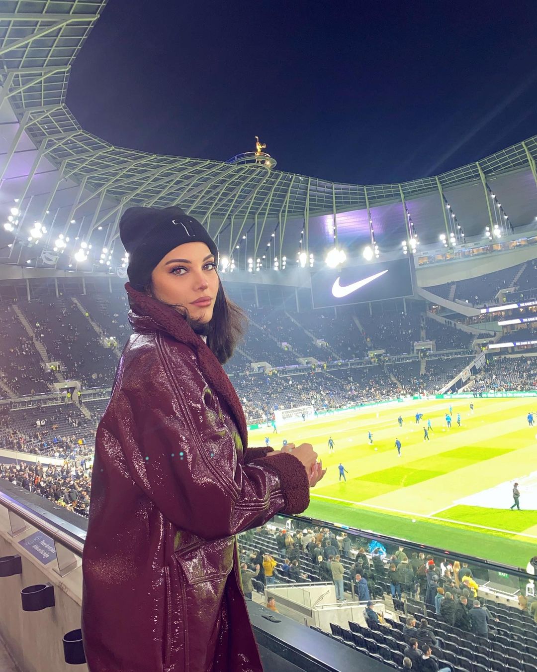 Tuvana standing in a stadium