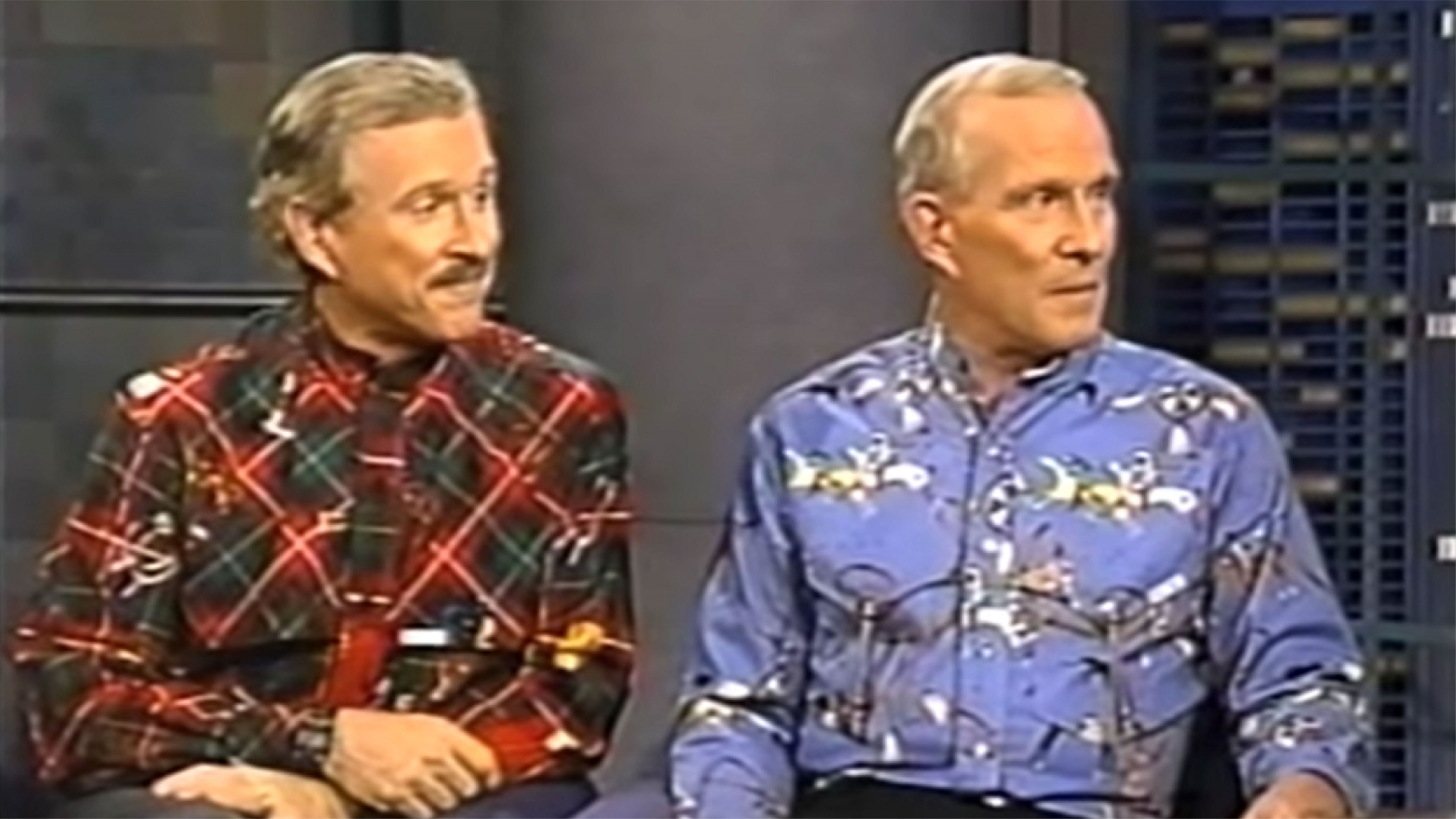 Smothers brothers wearing colorful and vibrant clothes