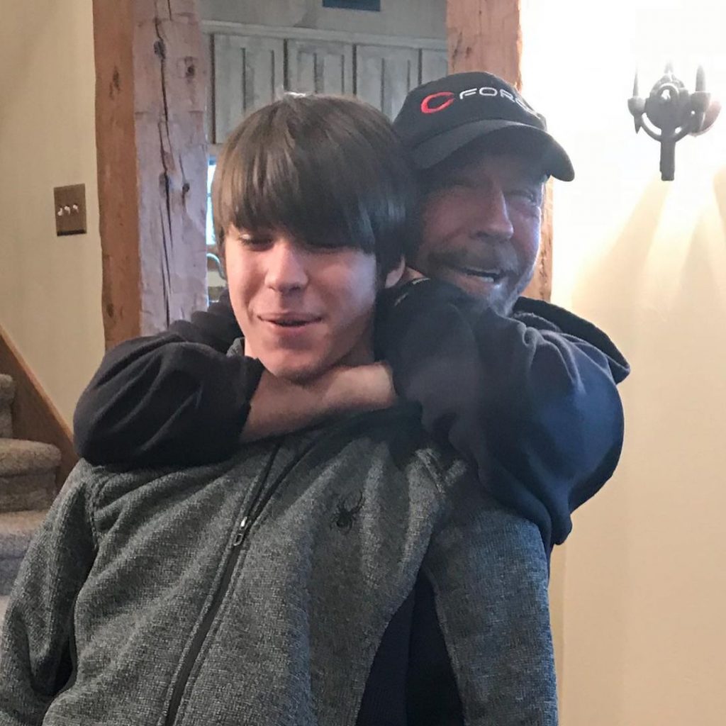 Dakota Norris with his father Chuck Norris learning martial arts technique