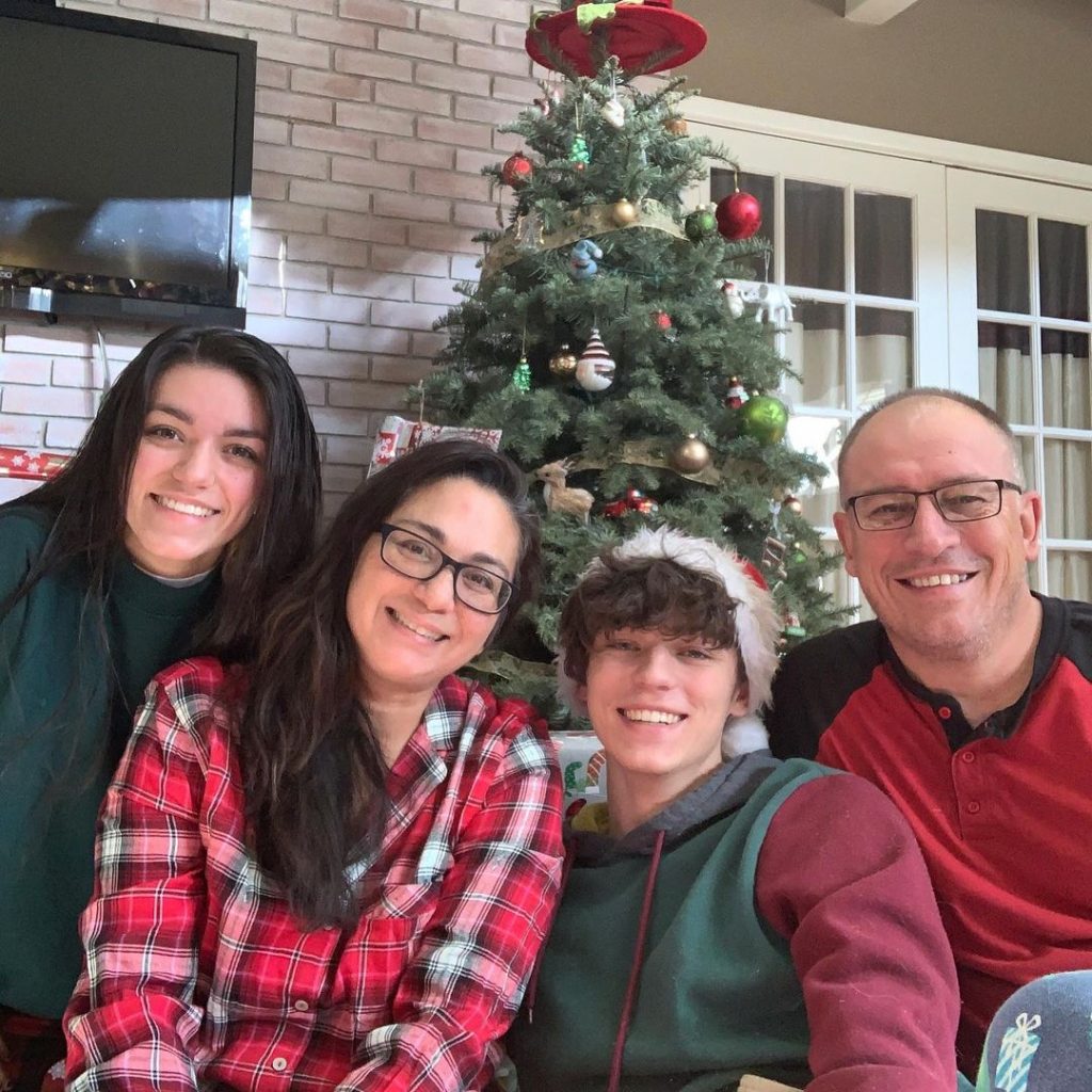 Tyler with his parents and sibling