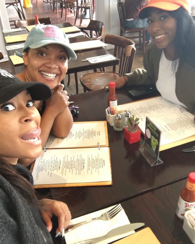 Tai taking a selfie while enjoying with her friends on lunch.