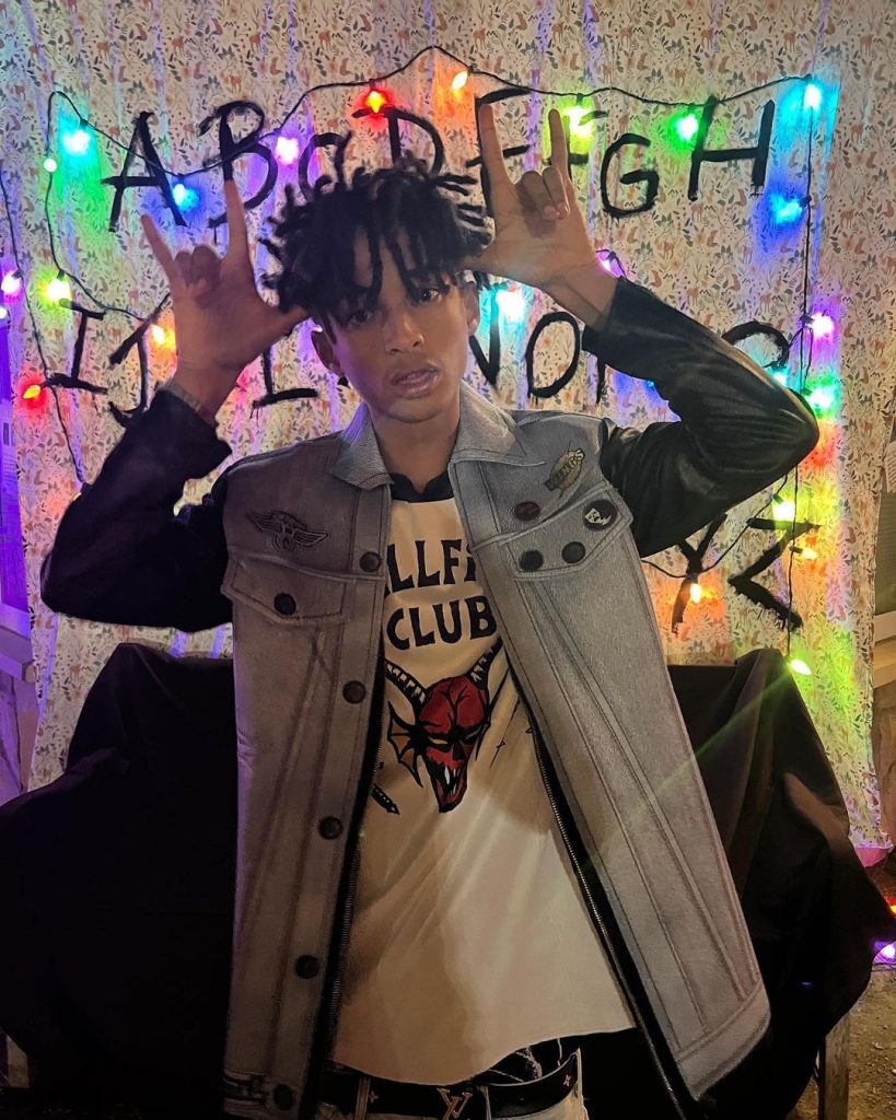 Jaden posing by wearing a shirt of Hellfire club