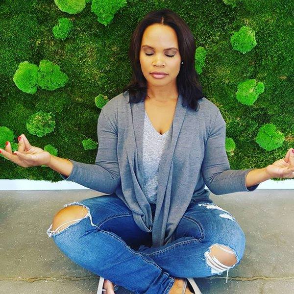 Laura posing in a pranayam mudra