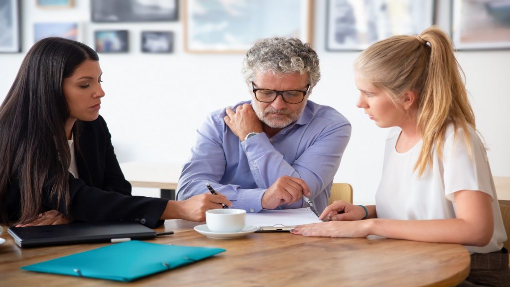 couple sitting together taking legal advice