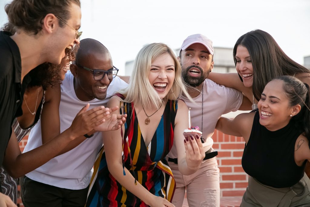 A girl enjoying time with her favorite people around.