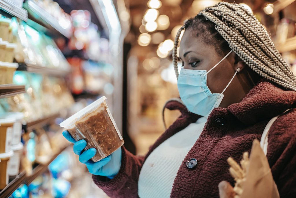 woman checking product before buying.